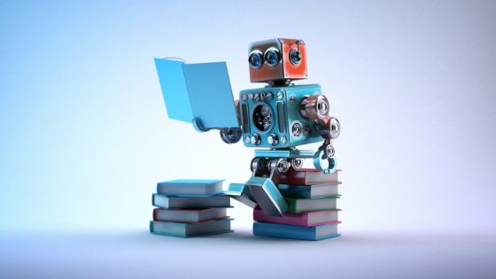 Robot sitting on a bunch of books, reading a book.