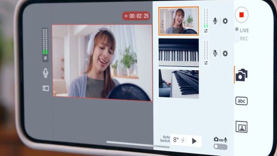 A close-up of Canon’s Live Switcher Mobile app on an iPhone being used by someone playing a piano.