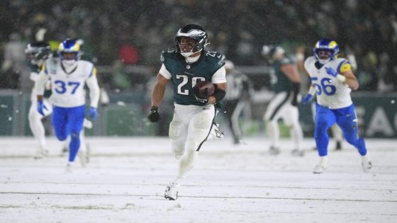 Eagles ride Saquon Barkley heroics, late defensive stand to snowy victory over Rams and NFC title game berth