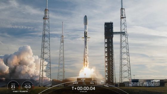 a black-and-white spacex falcon 9 rocket launches into a blue sky.