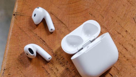 A hands-on photo of Apple’s AirPods 4 wireless earbuds.