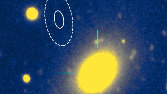 The location of the fast radio burst, indicated by the oval outlines, is on the outskirts of a massive elliptical galaxy, the yellow oval at right.