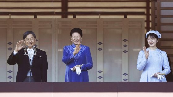 Japan's emperor marks 65th birthday with a call to keep telling the tragedy of WWII