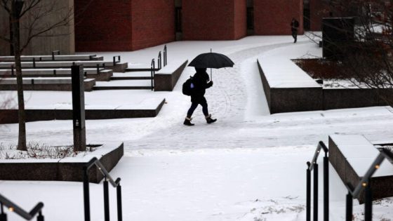 A snow covered walkway at Boston City Hall Plaza.