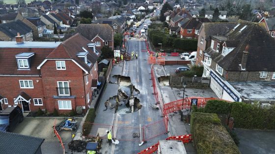 Sinkhole opens up on the main street of an English village