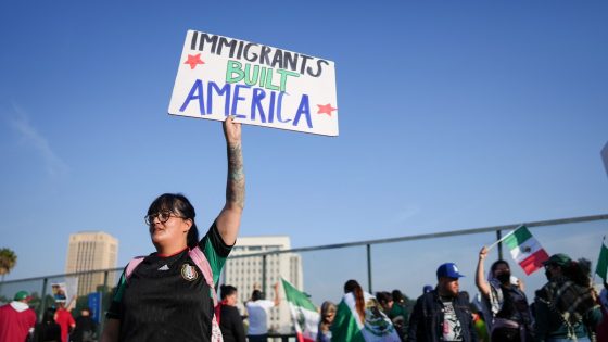 Marchers protesting planned deportations block major freeway in Los Angeles