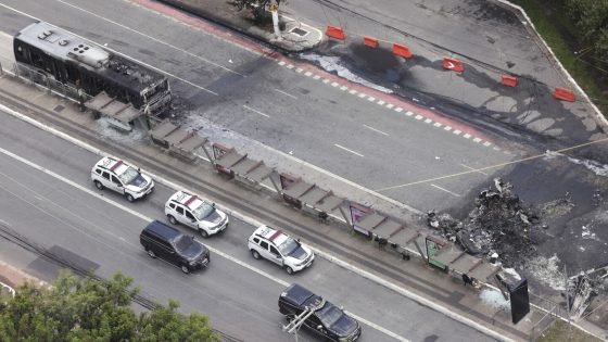 A small plane loses altitude after takeoff and slams into a Sao Paulo avenue, killing 2 passengers