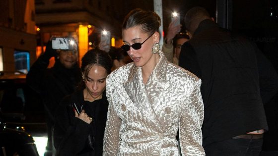 Hailey Bieber Wears No Pants and Padded Suit Coat With Zoë Kravitz In Paris