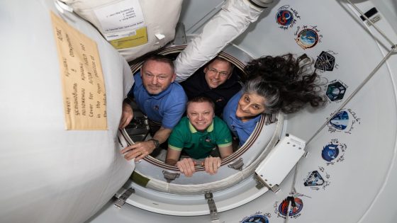 NASA's SpaceX Crew-9 members pose together for a portrait inside the vestibule between the International Space Station and the SpaceX Dragon crew spacecraft. Clockwise from left, are NASA astronauts Butch Wimore, Nick Hague, and Suni Williams, and Roscosmos cosmonaut Aleksandr Gorbunov.