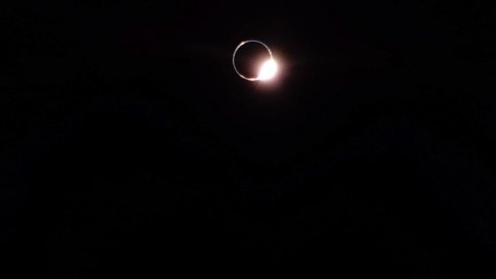 a bright ring of light on a completely black background