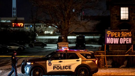 Gunfire erupts in Toronto pub, 12 injured as trio targets unsuspecting patrons.