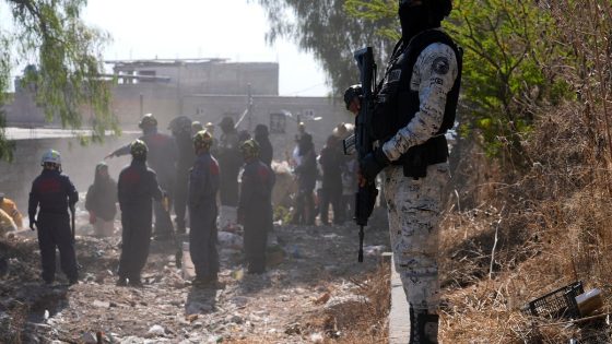 Masked gunmen threaten family searchers at suspected cartel training camp in shocking video.