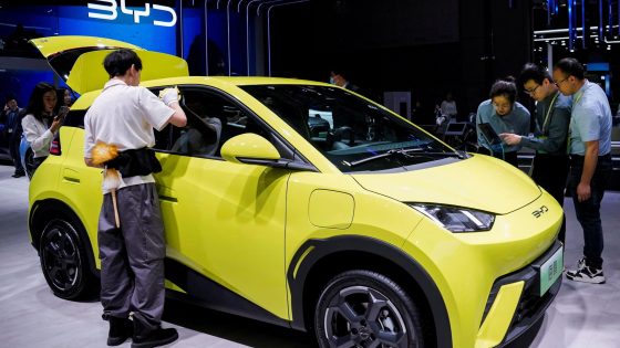 Chinese EV shares tumble as BYD sparks ‘rat race’ price war fears - Financial Times