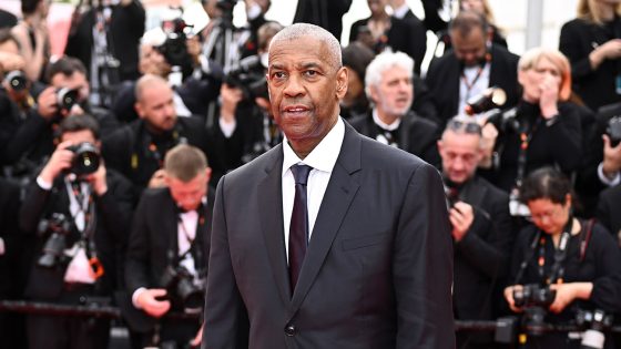 Denzel Washington attends the Highest 2 Lowest red carpet at the 78th annual Cannes Film Festival at Palais des Festivals on May 19, 2025 in Cannes, France.