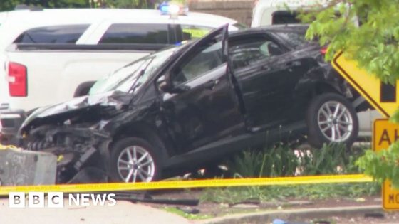 Father charged with killing deputy a day after police killed son