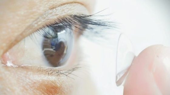 closeup of Study participant putting contacts in