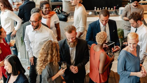a photo of a group of people at a cocktail party