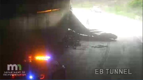 Westbound I-94 closed at Lowry Tunnel after semi hits wall, spills load of ammunition