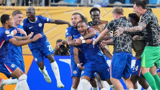 Chelsea's Christopher Nkunku is congratulated after scoring his teams second goal during the Club World Cup round of 16 soccer match between Benfica and Chelsea in Charlotte, N.C., Saturday, June 28, 2025. (AP Photo/Chris Carlson)