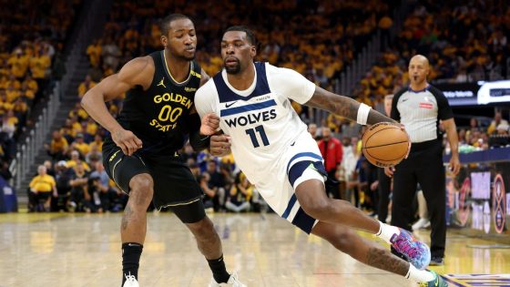 Sources -- Reid to sign 5-year, $125M deal to stay with Wolves