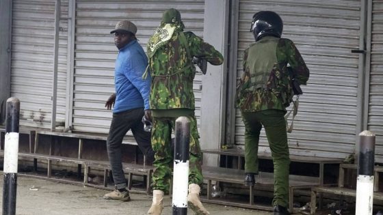 Photos show Kenyan police officer shooting a civilian at close range