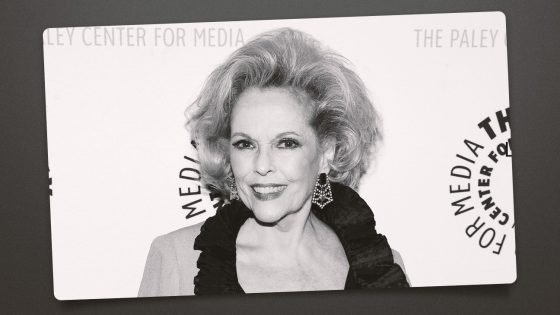 Eileen Fulton smiling on a carpet