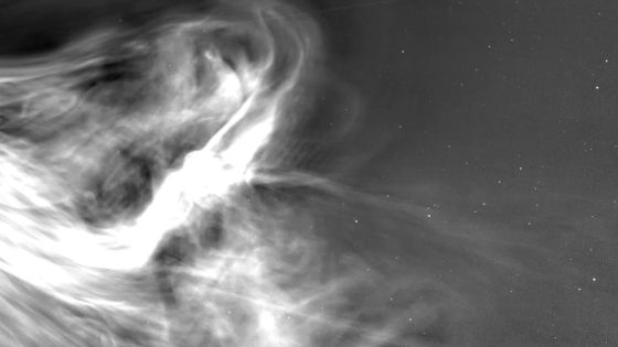 bright wisps of light on a starry background