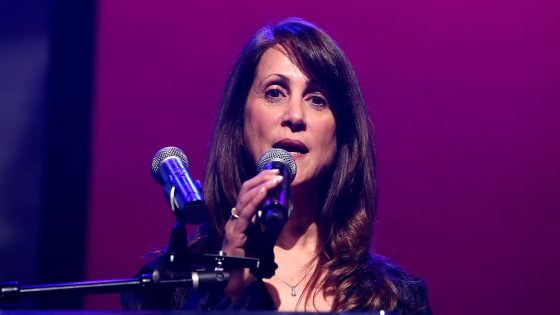 Man arrested in slayings of 'American Idol' music producer, husband