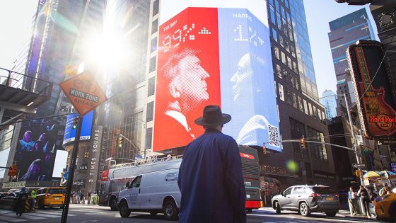 A billboard for Kalshi showing 2024 US presidential election odds.