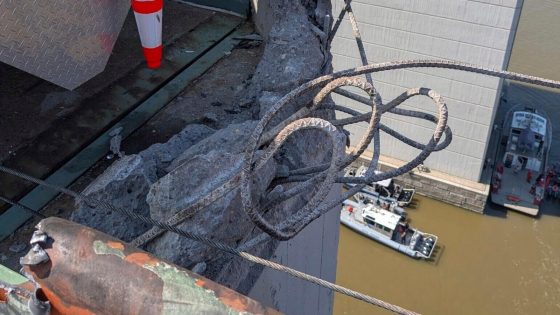 Truck smashes through barrier and plunges off a bridge into the Delaware River