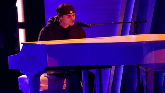 Justin Bieber performs "Peaches" at the 64th Annual Grammy Awards on Sunday, April 3, ...
