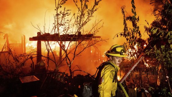 Firefighters work to contain rapidly moving blaze in California gold mining town