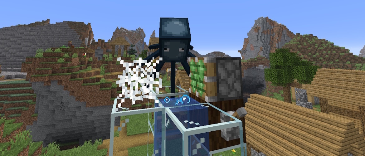 A squid on top of a bubble column. There is a cobweb next to it, and a sticky piston pointed towards both, with the squid between the cobweb and the sticky piston. The contraption stands in a plains village with windswept gravelly hills in the background.